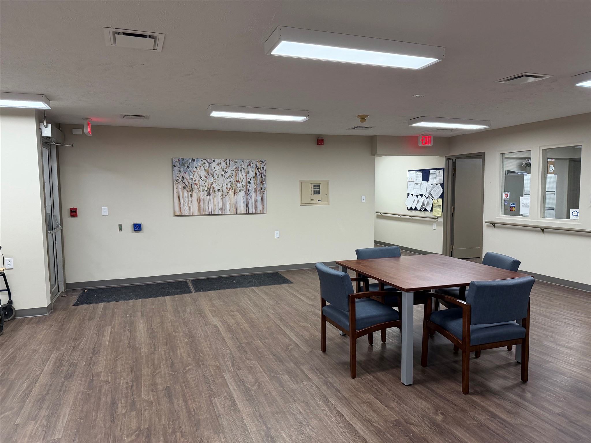 1700 Park Street Beatrice, NE 68310 - Photo 6 of 13 a view of a dining area with furniture and wooden floor