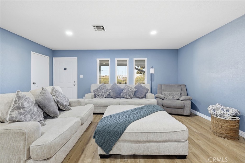 a living room with furniture and a couch