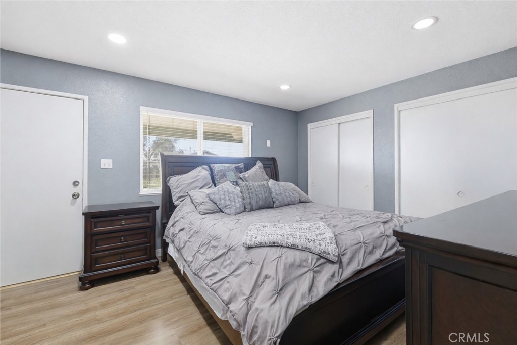 1032 South Farragut Street Ridgecrest, CA 93555 - Photo 18 of 22 a bedroom with a bed and a window