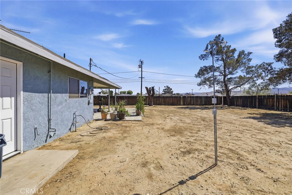 1032 South Farragut Street Ridgecrest, CA 93555 - Photo 19 of 22 a view of a backyard