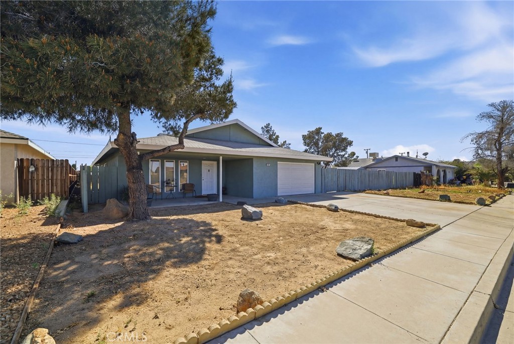 1032 South Farragut Street Ridgecrest, CA 93555 - Photo 3 of 22 a view of a house with snow on the side of road