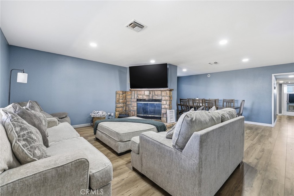 1032 South Farragut Street Ridgecrest, CA 93555 - Photo 5 of 22 a living room with furniture and a flat screen tv