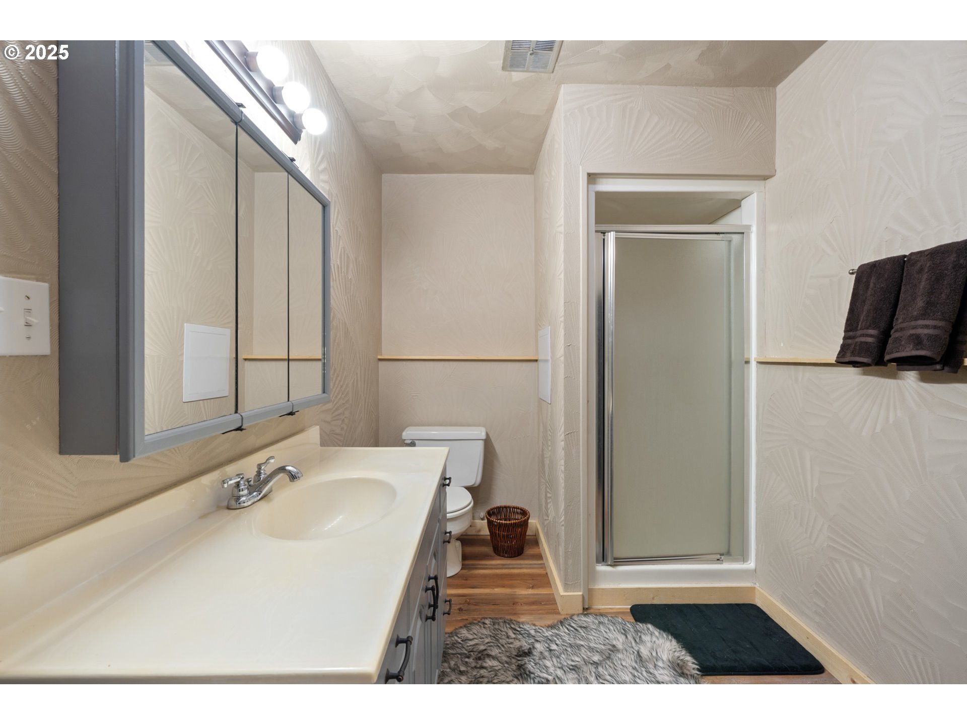 1960 Alder Cove Road West Netarts, OR 97141 - Photo 27 of 41 a bathroom with a sink and a mirror