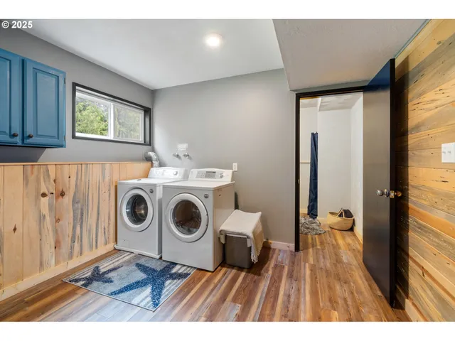 a utility room with dryer and washer