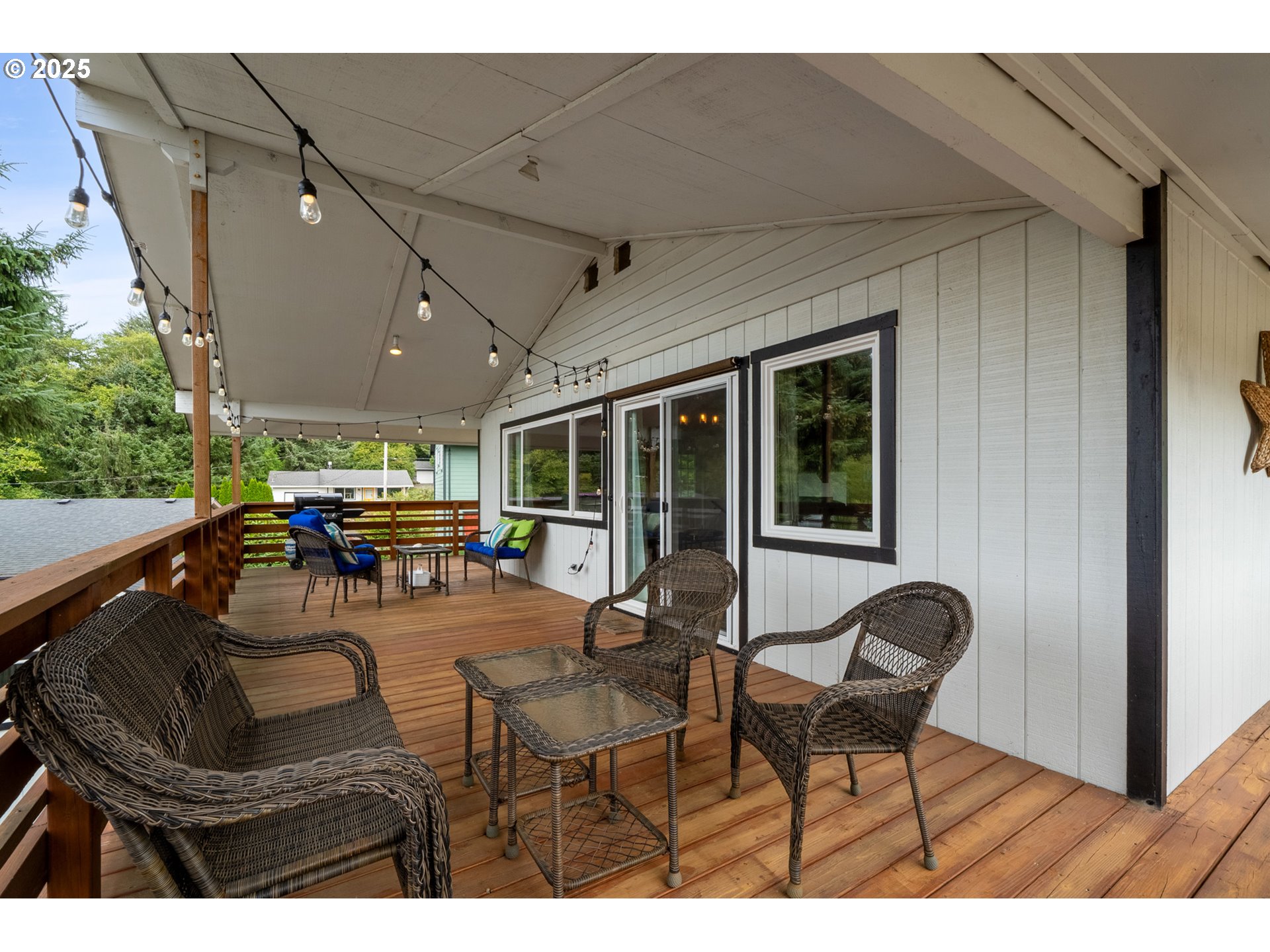 1960 Alder Cove Road West Netarts, OR 97141 - Photo 34 of 41 a view of a patio with table and chairs