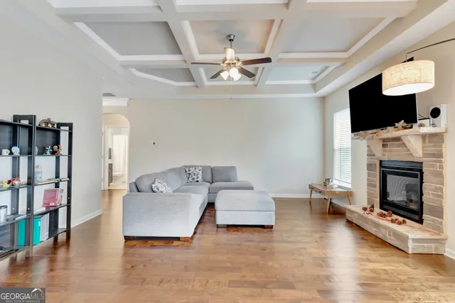 a kitchen with stainless steel appliances granite countertop a stove microwave and cabinets