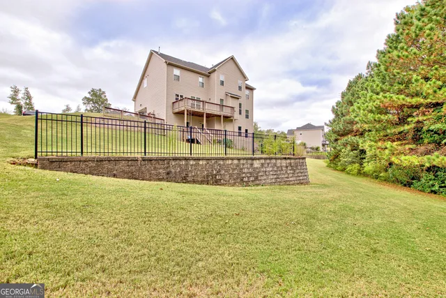 a view of a swimming pool with a patio