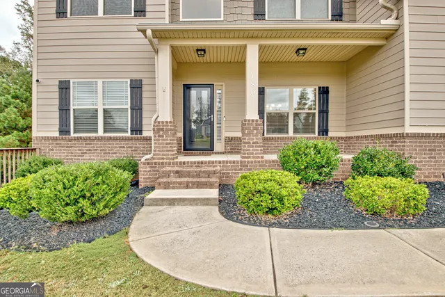 a view of livingroom with furniture and wooden floor