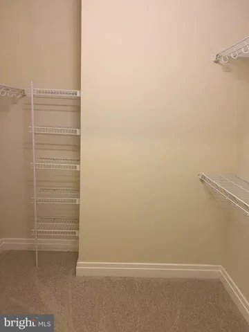 a view of a building with sitting area