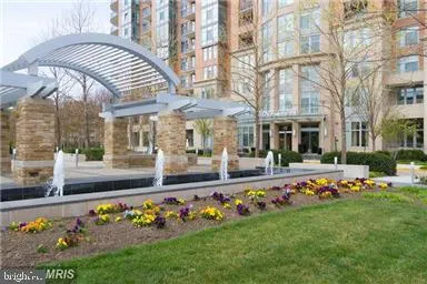 a view of a living room and a chandelier