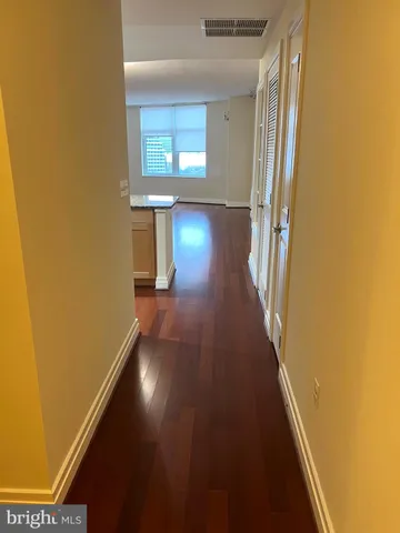 a bathroom with a granite countertop toilet a sink and bathtub