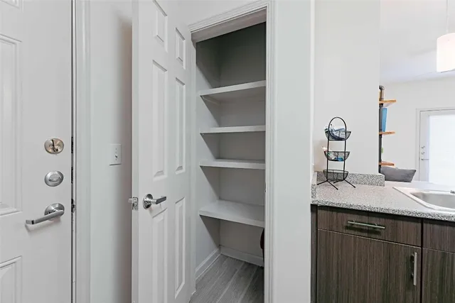 a bathroom with a sink and vanity