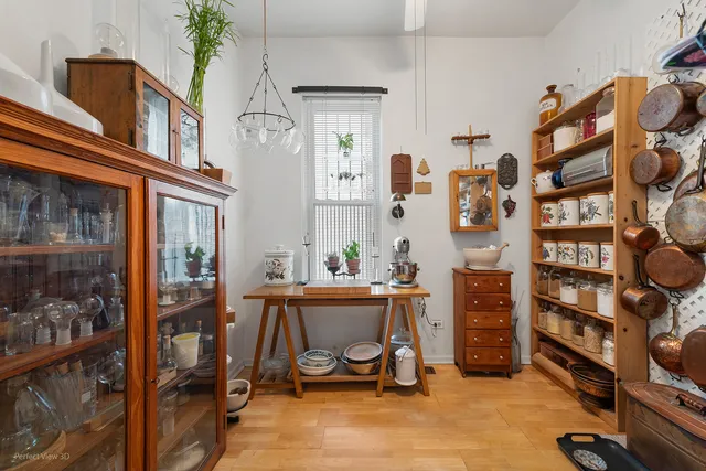 a view of a workspace with furniture and toys