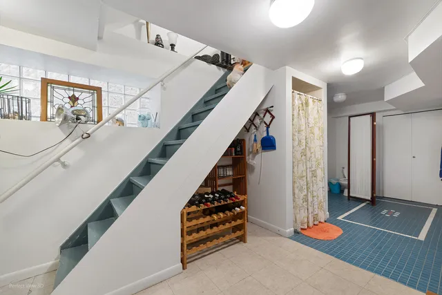 a view of entryway with stairs and wooden floor