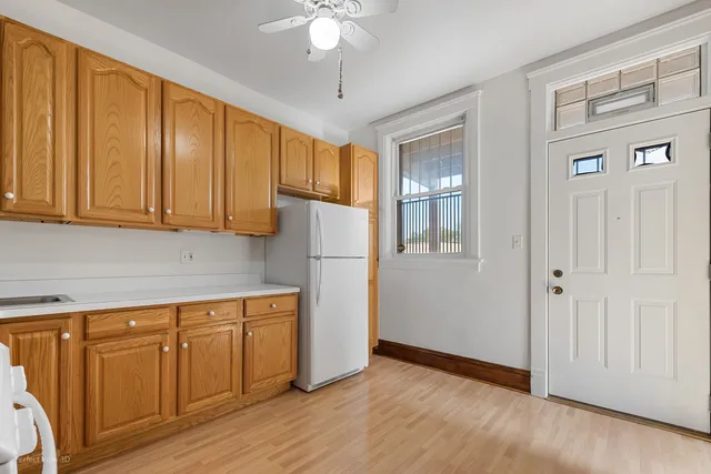 a view of a kitchen with electric appliances