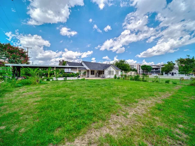 a aerial view of a house with garden