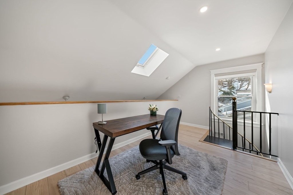 53 North Mead Street, Unit C10 Boston, MA 02129 - Photo 12 of 15 a view of a workspace with furniture and a window
