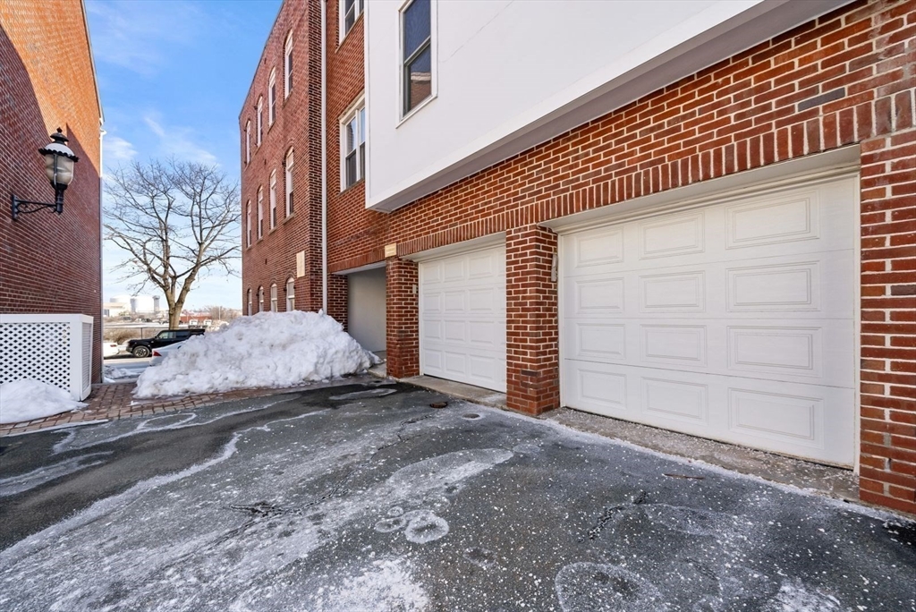 53 North Mead Street, Unit C10 Boston, MA 02129 - Photo 13 of 15 a view of a house with a yard
