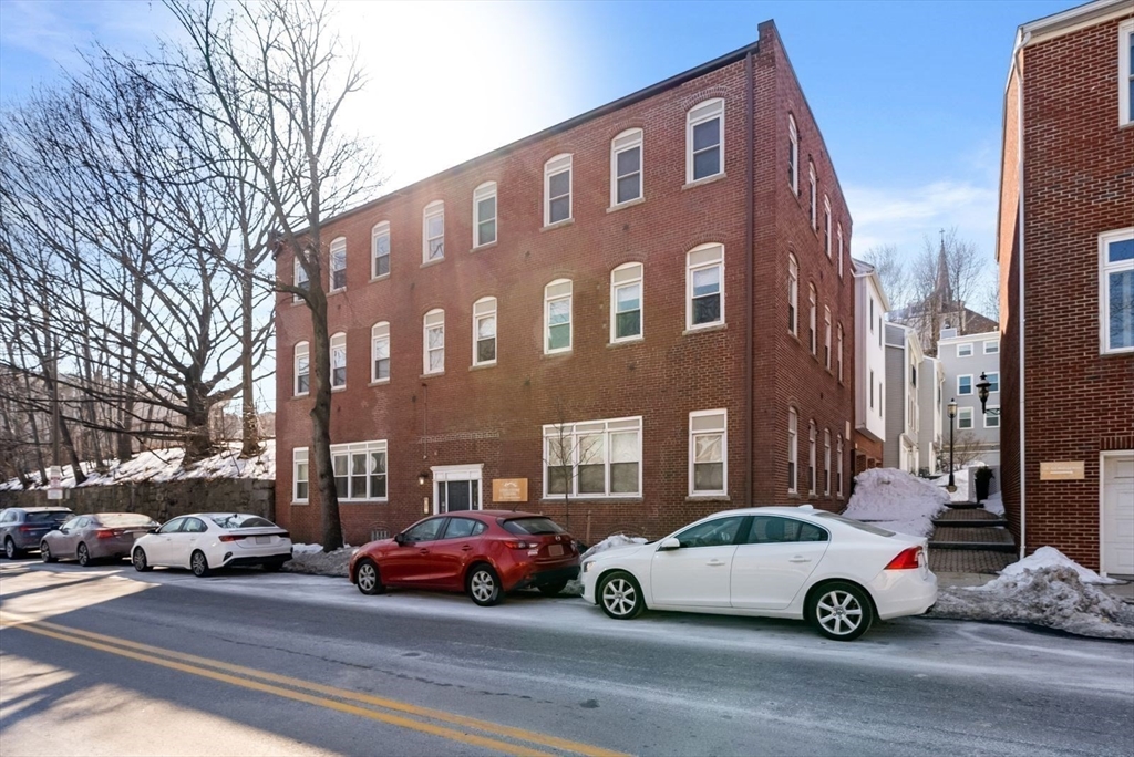 53 North Mead Street, Unit C10 Boston, MA 02129 - Photo 15 of 15 a car parked in front of a building