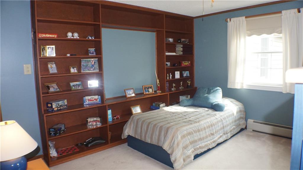332 Aroostook Road Fort Kent, ME 04743 - Photo 17 of 34 Bedroom 2 with custom book shelves