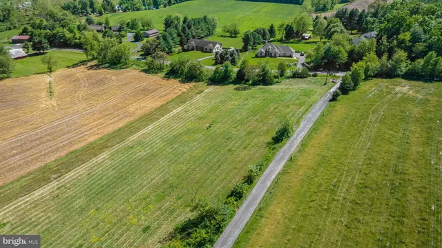 a view of swimming pool from a balcony