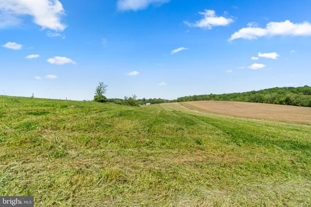 a view of an ocean and a yard
