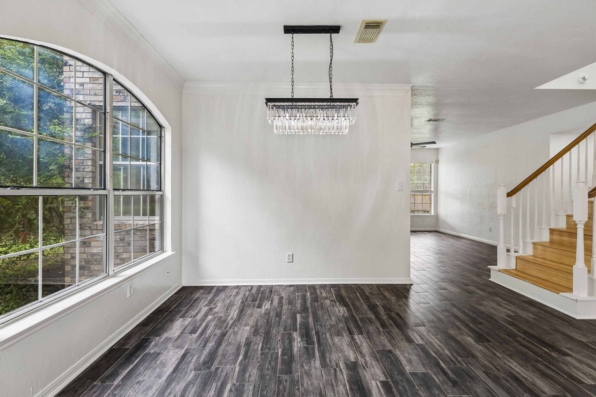 10400 O'Rourk Lane Austin, TX 78739 - Photo 23 of 33 a view of empty room with wooden floor and fan
