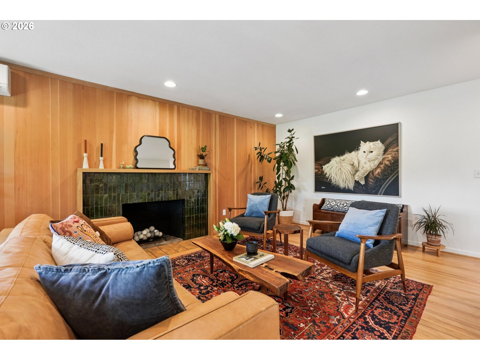 7225 Southwest 13th Avenue Portland, OR 97219 - Photo 9 of 48 a living room with furniture and a fireplace