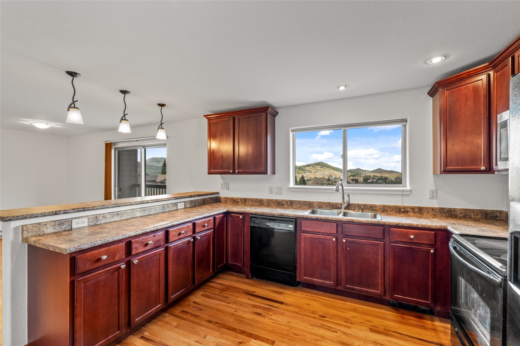 127 Oak Ridge Circle, Unit 104 Oak Creek, CO 80467 - Photo 1 of 26 a kitchen with lots of counter space and sink