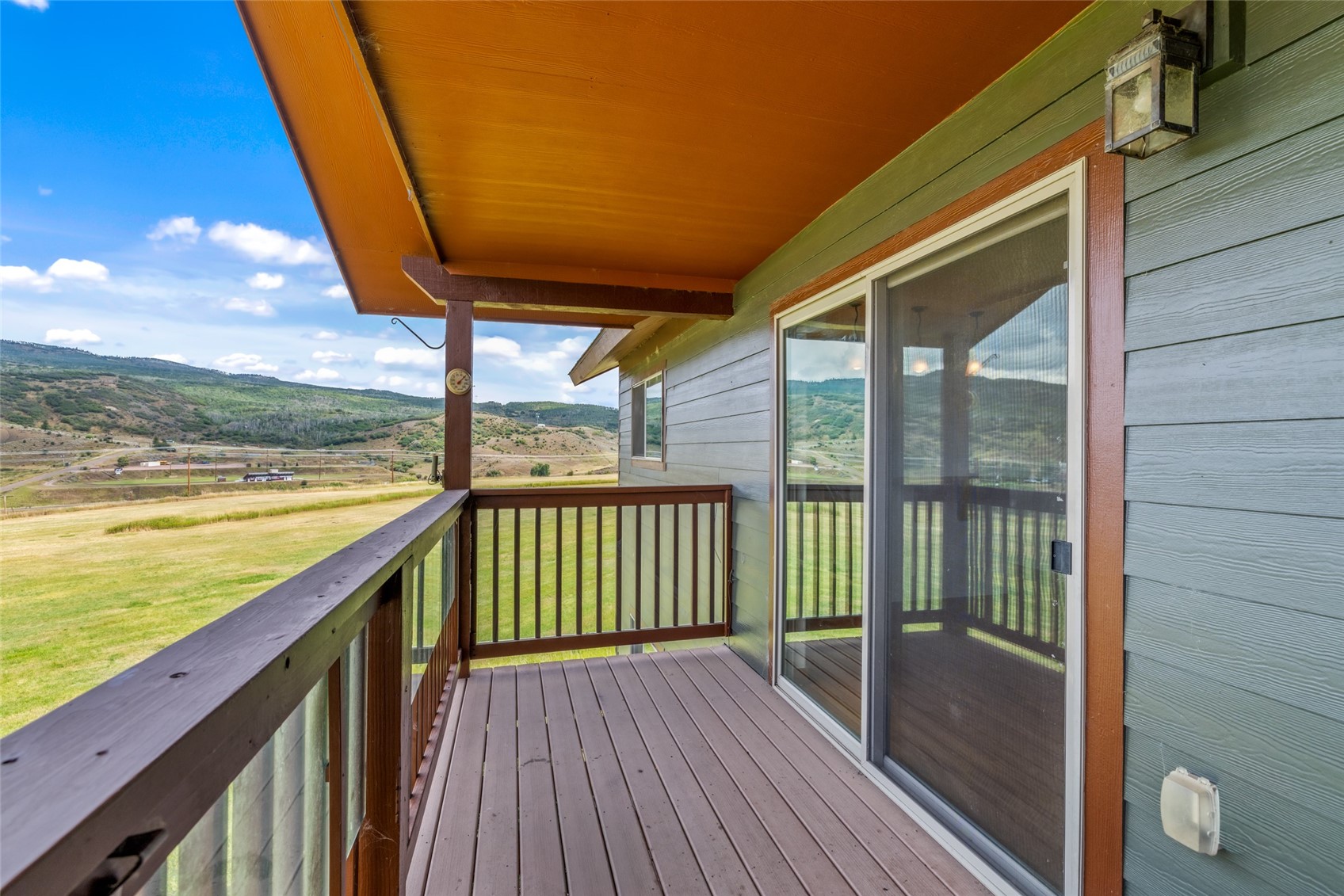 127 Oak Ridge Circle, Unit 104 Oak Creek, CO 80467 - Photo 24 of 26 a view of balcony with wooden floor