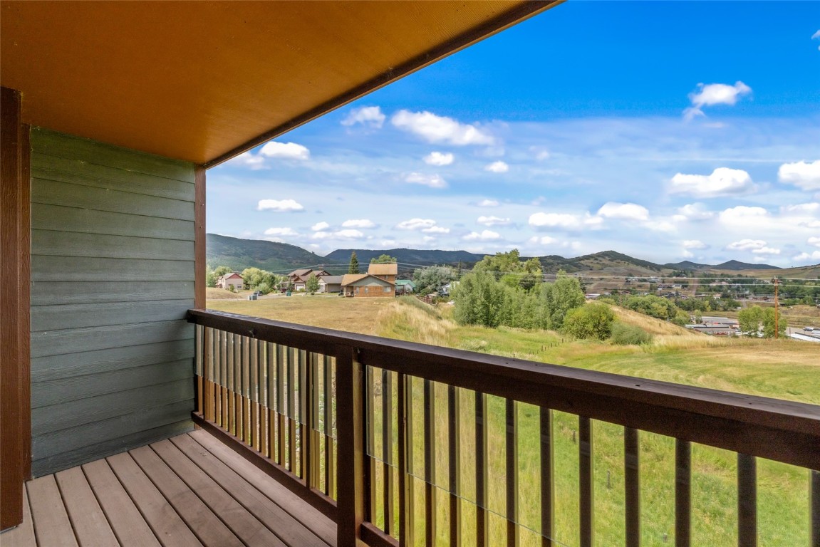 127 Oak Ridge Circle, Unit 104 Oak Creek, CO 80467 - Photo 25 of 26 a view of a balcony with an outdoor space