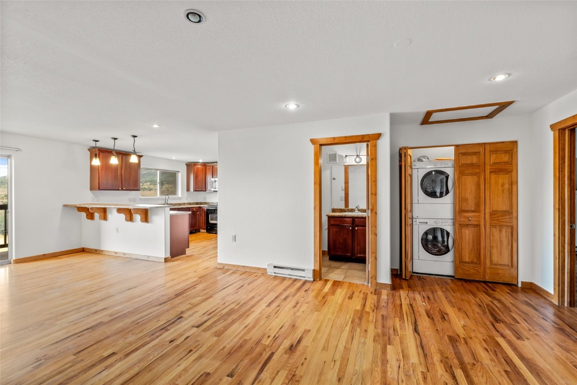 127 Oak Ridge Circle, Unit 104 Oak Creek, CO 80467 - Photo 9 of 26 a view of a kitchen with wooden floor and windows