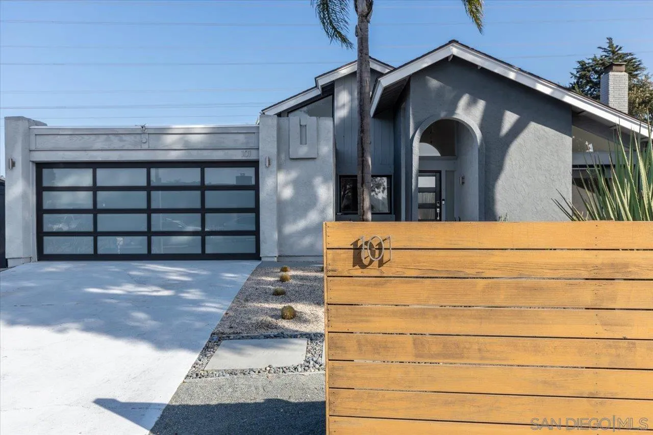 101 Rodney Avenue Encinitas, CA 92024 - Photo 2 of 31 a front view of a house with a garage