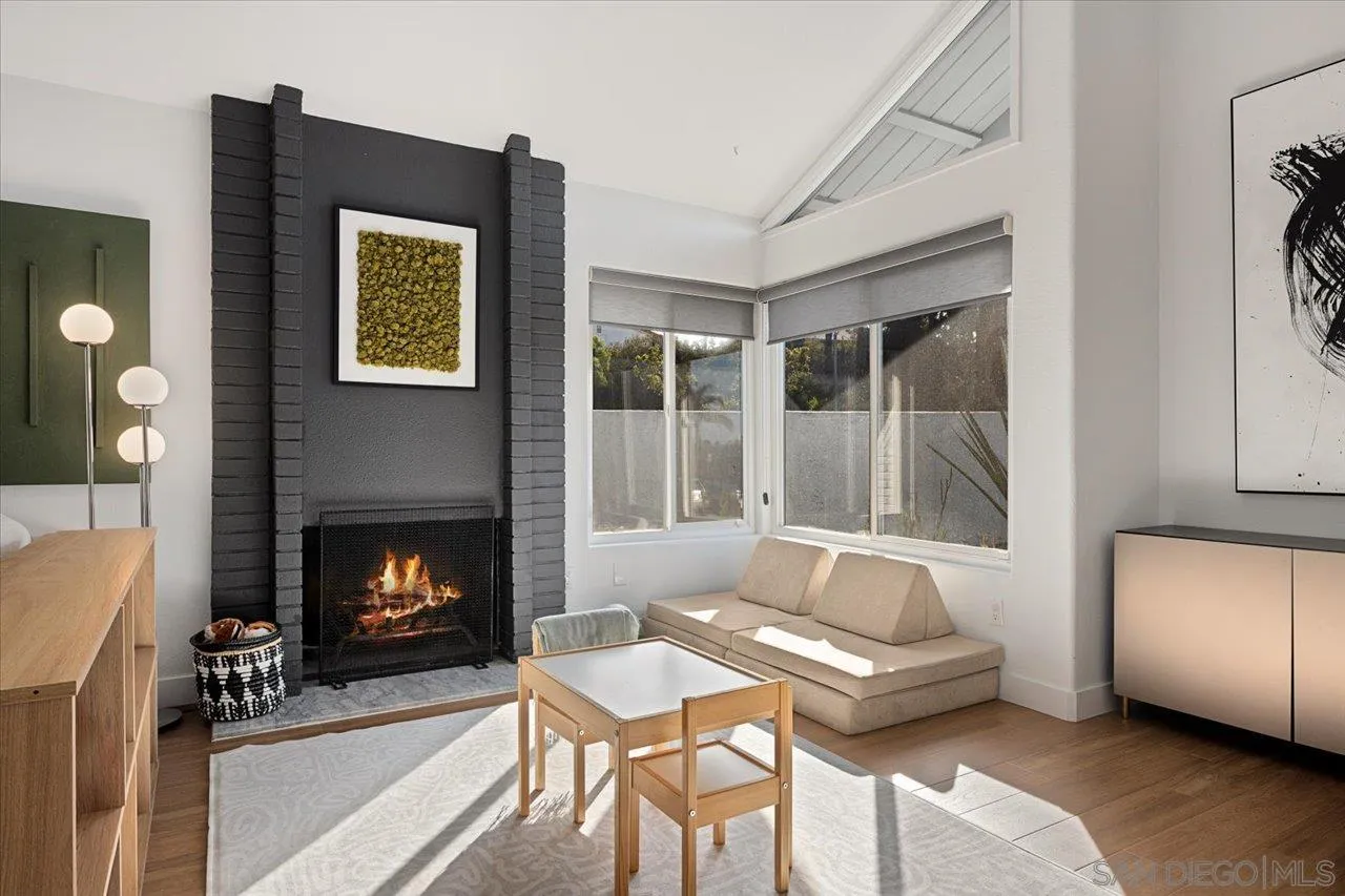 101 Rodney Avenue Encinitas, CA 92024 - Photo 6 of 31 a living room with furniture and a fireplace