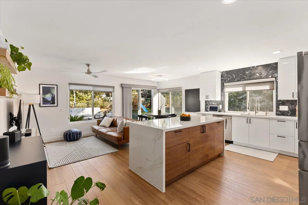 101 Rodney Avenue Encinitas, CA 92024 - Photo 7 of 31 a view of a living room kitchen and a large window