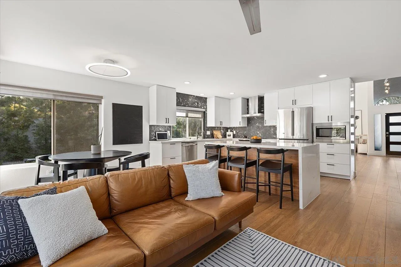 101 Rodney Avenue Encinitas, CA 92024 - Photo 10 of 31 a living room with furniture and a flat screen tv