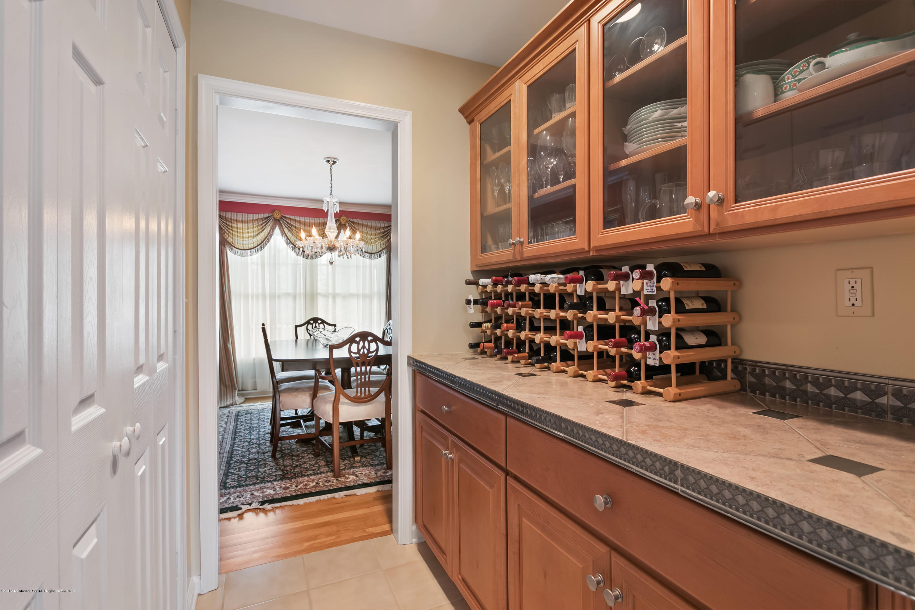 94 Ave Of Two Rivers Rumson, NJ 07760 - Photo 12 of 41 a kitchen with a refrigerator and a window