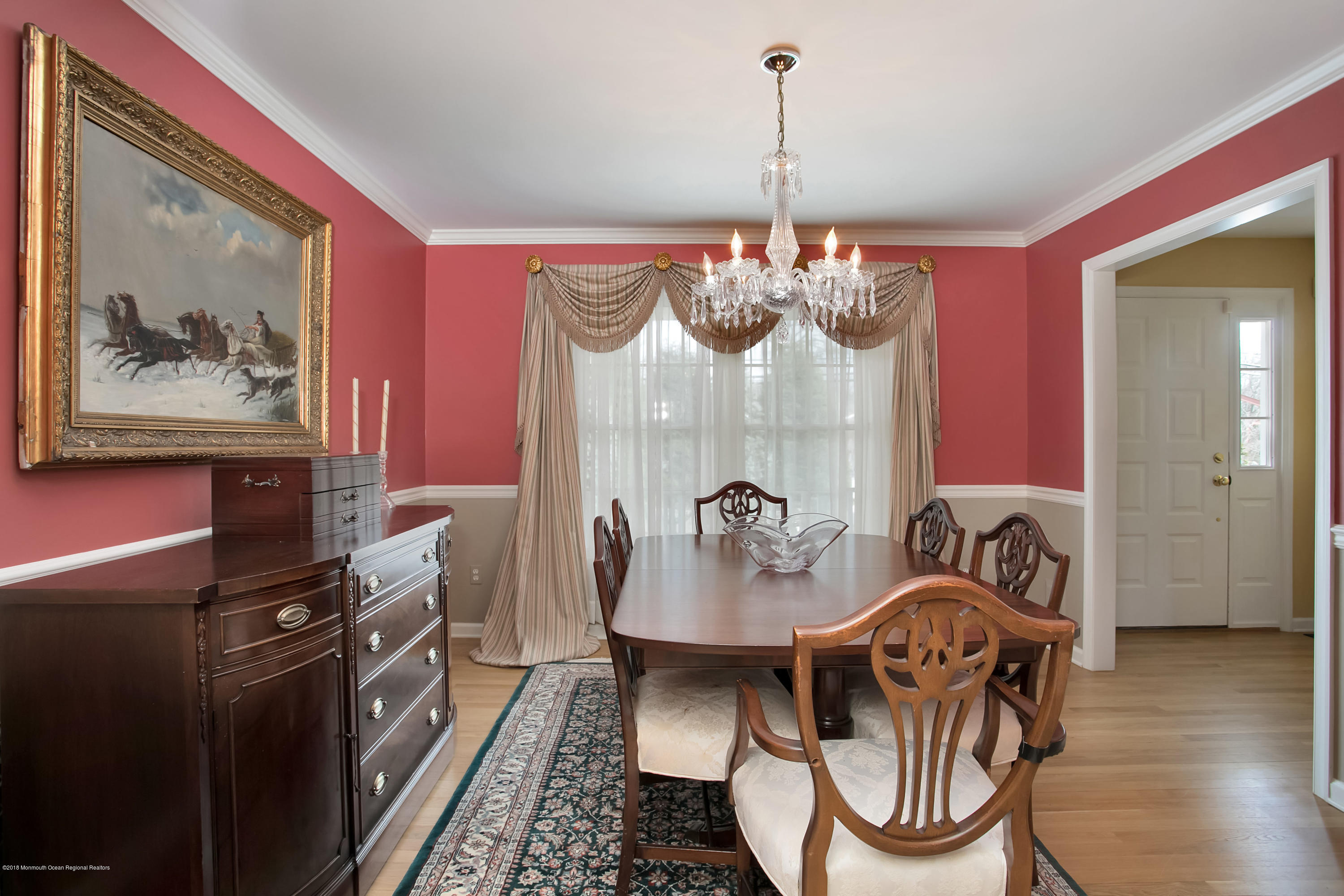 94 Ave Of Two Rivers Rumson, NJ 07760 - Photo 14 of 41 a living room with furniture and a chandelier