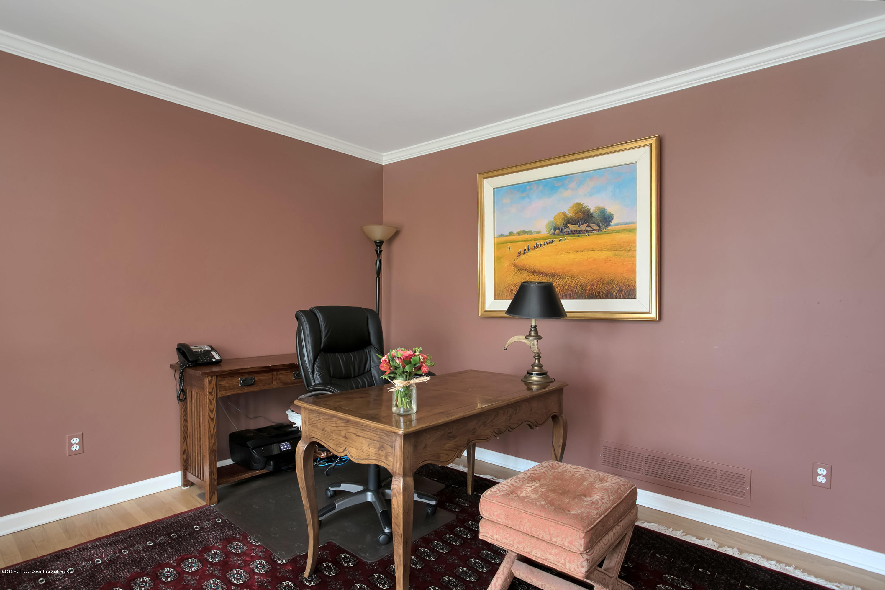 94 Ave Of Two Rivers Rumson, NJ 07760 - Photo 16 of 41 a workspace with furniture and lamp