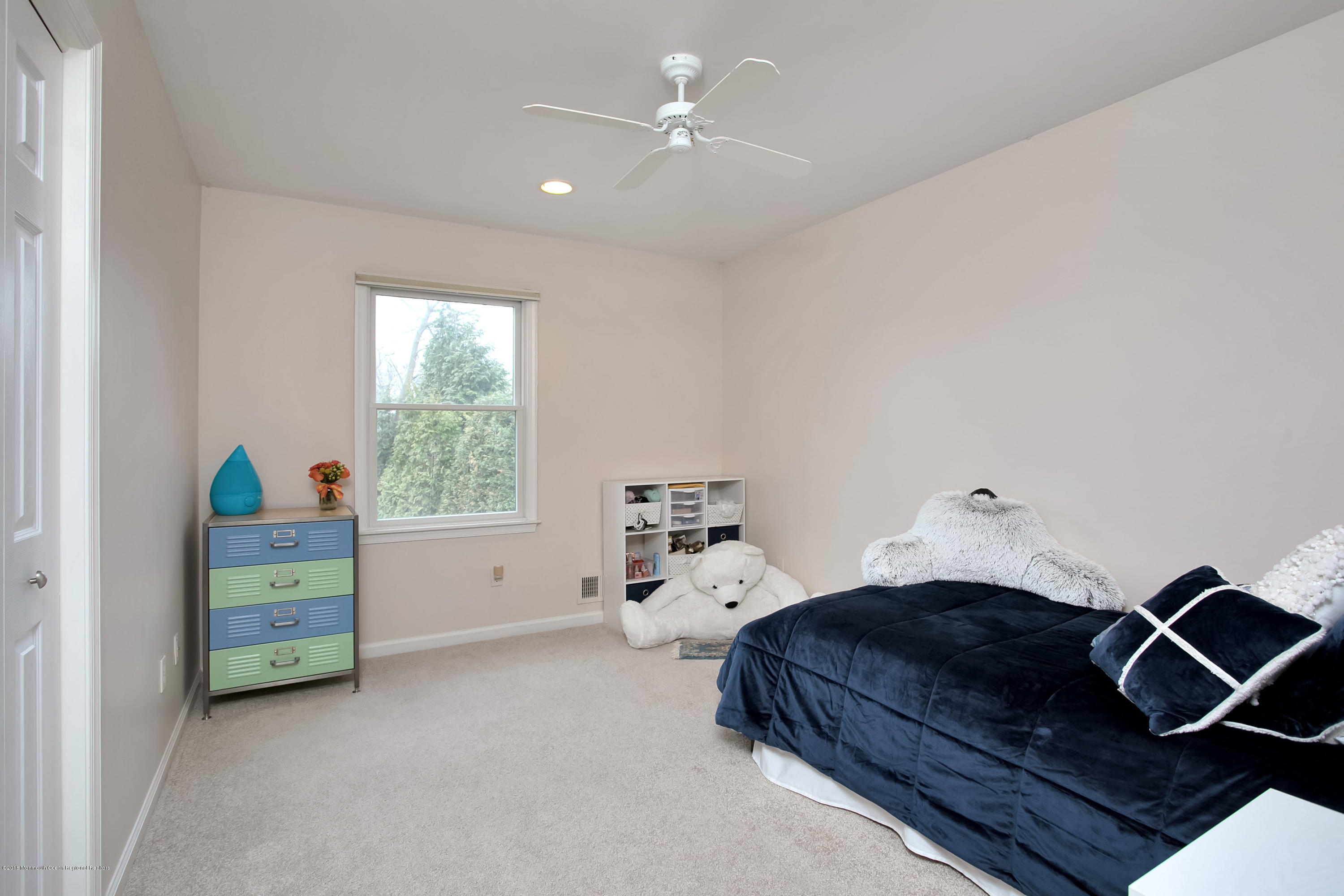 94 Ave Of Two Rivers Rumson, NJ 07760 - Photo 25 of 41 a bedroom with a bed and a window