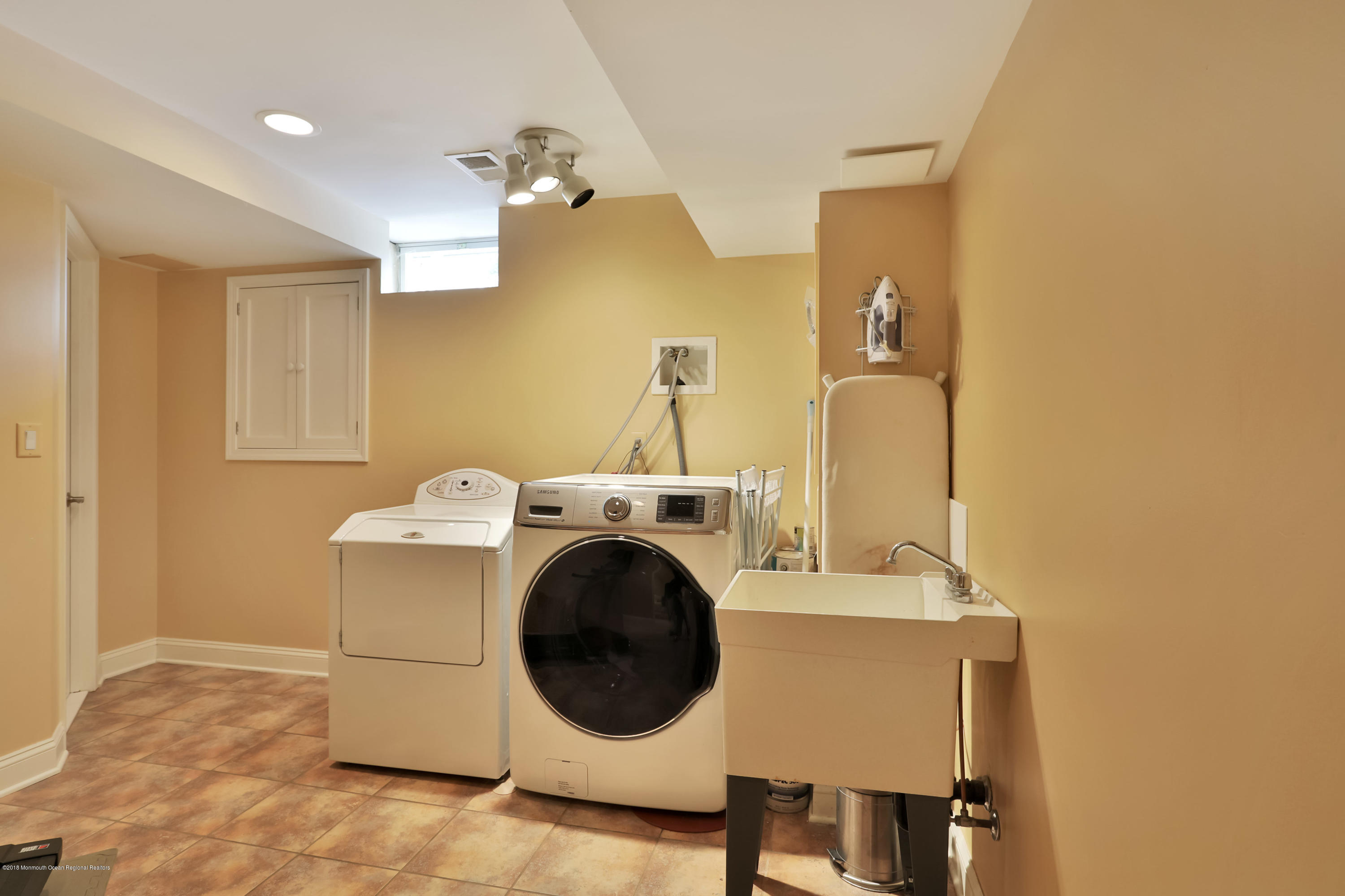 94 Ave Of Two Rivers Rumson, NJ 07760 - Photo 32 of 41 a utility room with dryer and washer