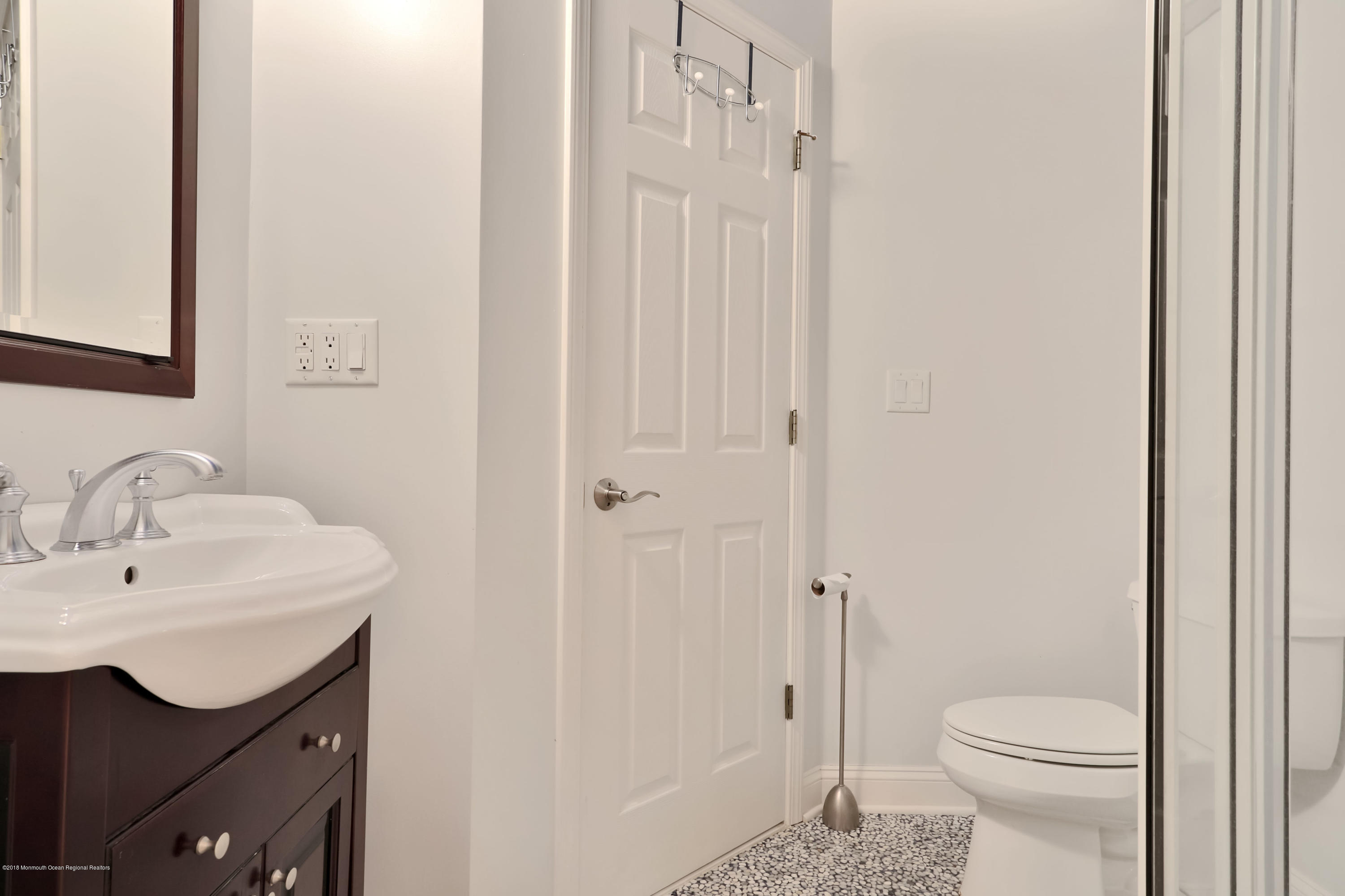 94 Ave Of Two Rivers Rumson, NJ 07760 - Photo 35 of 41 a bathroom with a sink a toilet and shower