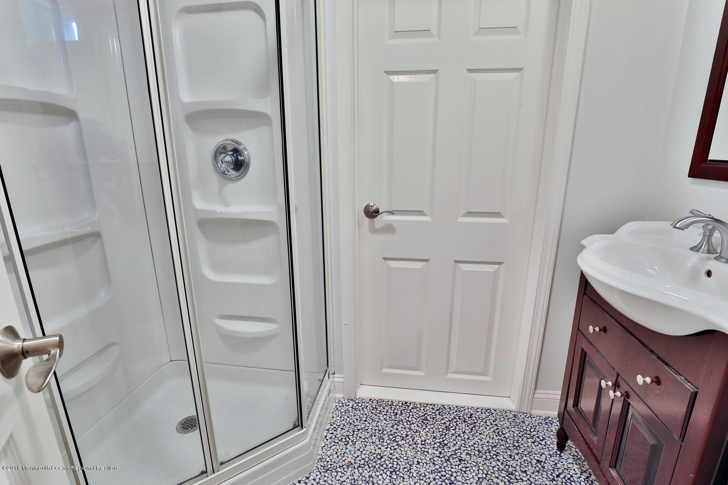 94 Ave Of Two Rivers Rumson, NJ 07760 - Photo 36 of 41 a bathroom with a shower and a sink