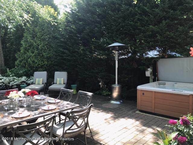 94 Ave Of Two Rivers Rumson, NJ 07760 - Photo 38 of 41 a outdoor dining space with furniture and potted plants
