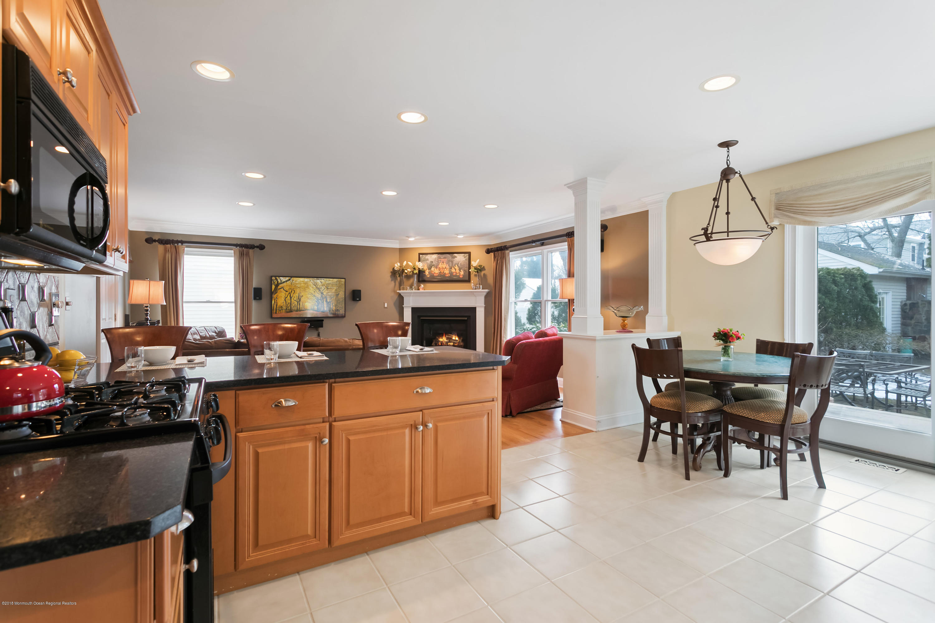 94 Ave Of Two Rivers Rumson, NJ 07760 - Photo 4 of 41 a kitchen with lots of counter top space and dining table