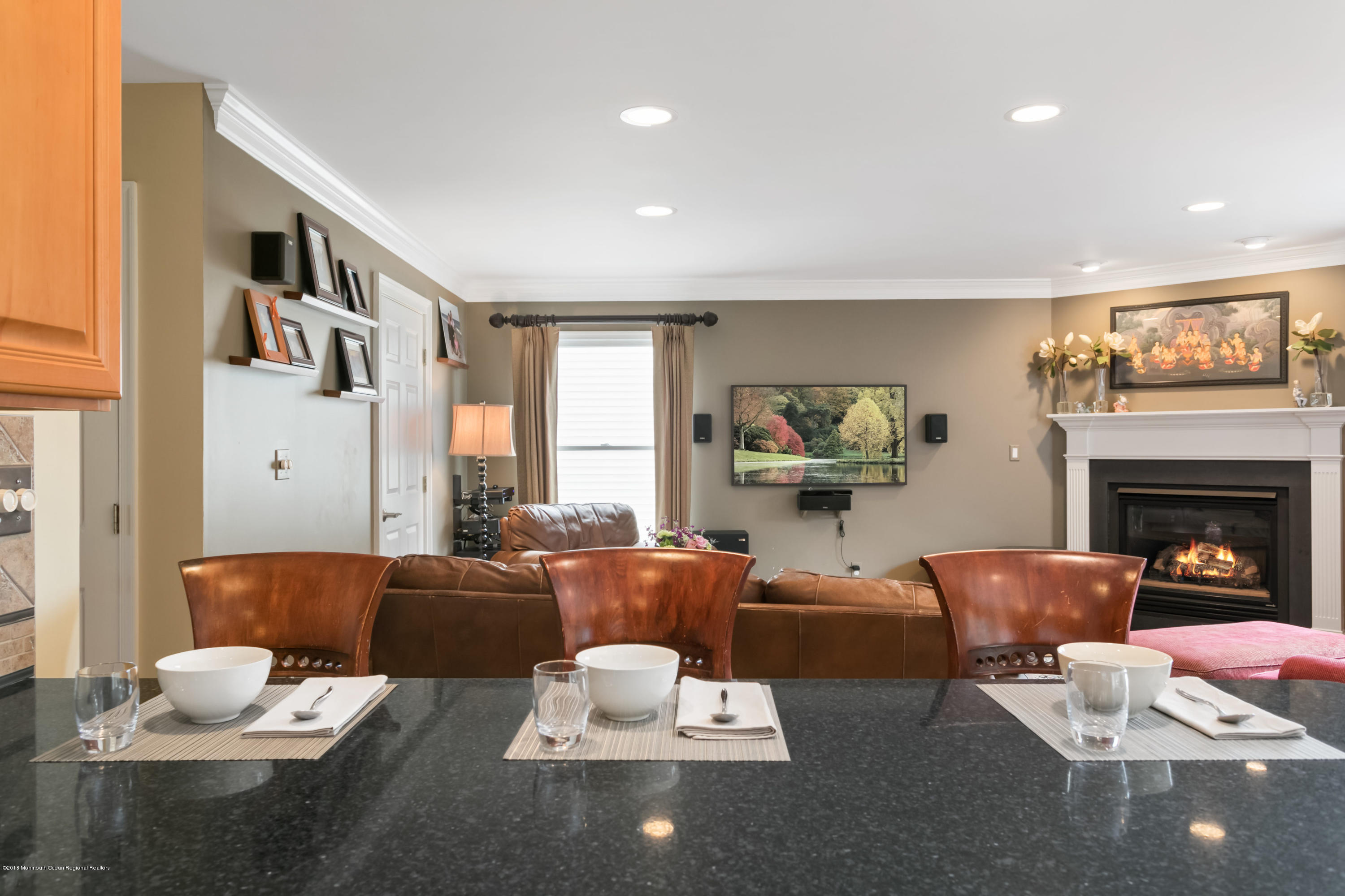 94 Ave Of Two Rivers Rumson, NJ 07760 - Photo 5 of 41 a living room with furniture and a fireplace