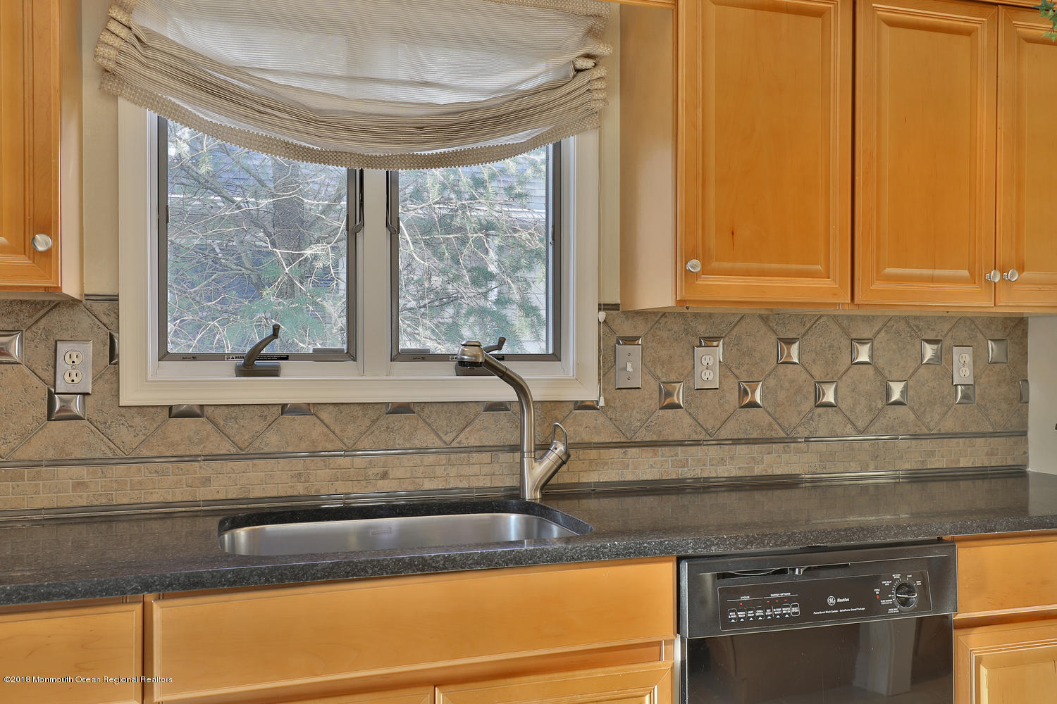 94 Ave Of Two Rivers Rumson, NJ 07760 - Photo 7 of 41 a view of a sink and a granite counter top