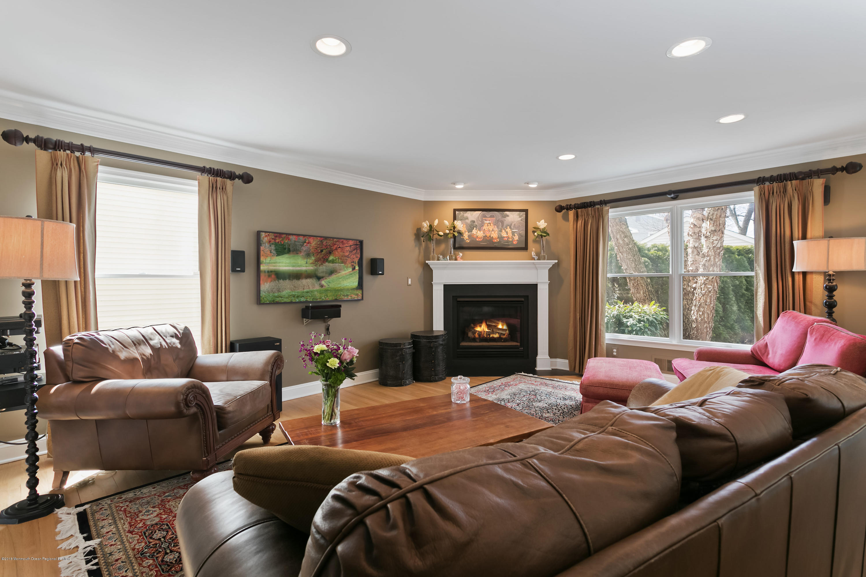 94 Ave Of Two Rivers Rumson, NJ 07760 - Photo 9 of 41 a bed room with a bed and a fireplace