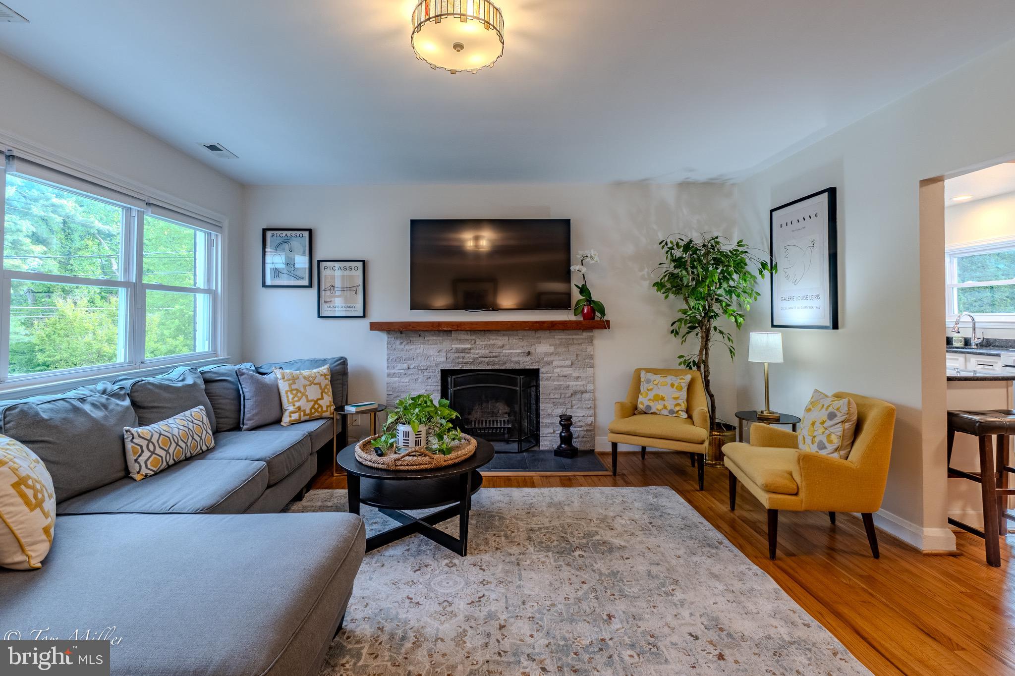 418 Range Road Baltimore, MD 21204 - Photo 6 of 39 Light-filled Living Room with lovely Fireplace