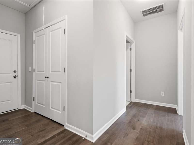 1495 Kansas Jake Road Waco, GA 30182 - Photo 19 of 34 a view of a livingroom with wooden floor